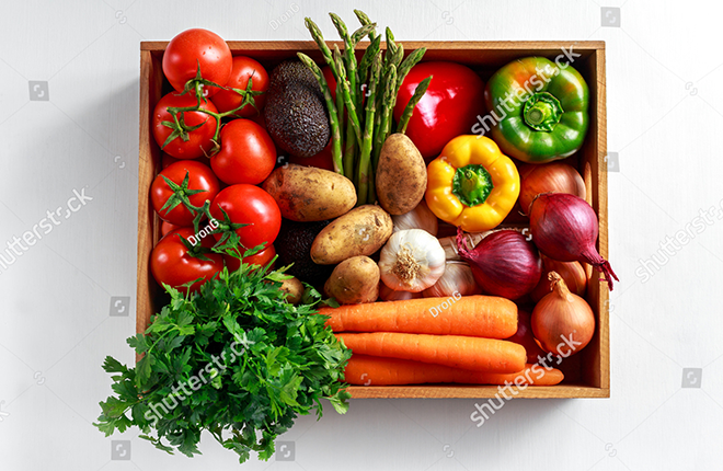 stock-photo-fresh-vegetables-in-wooden-box-on-white-wooden-background-617760569.png